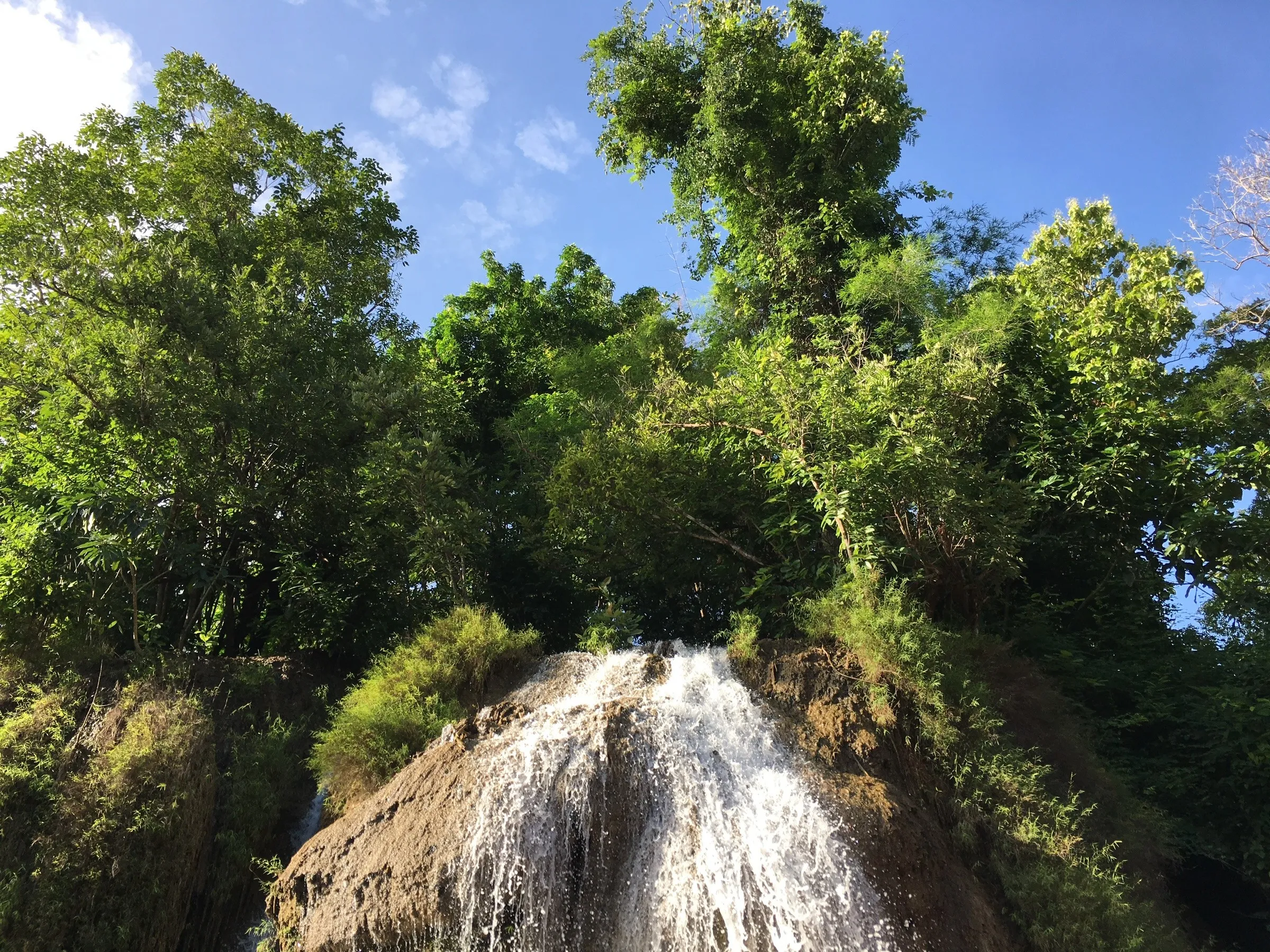 A jungle waterfall tumbling through the forest in Sai Yok National Park, Thailand.